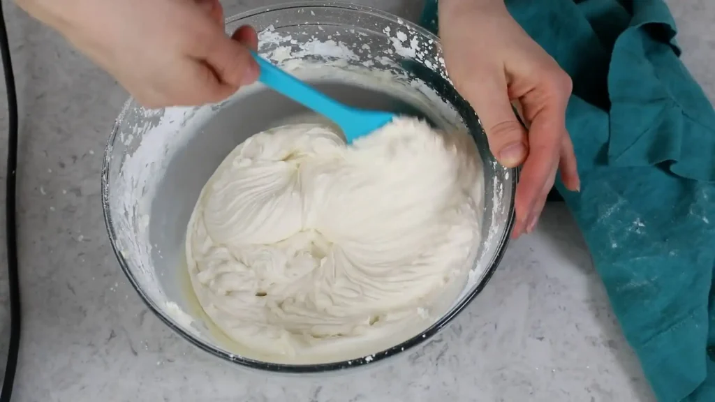 making of frosting in a bowl