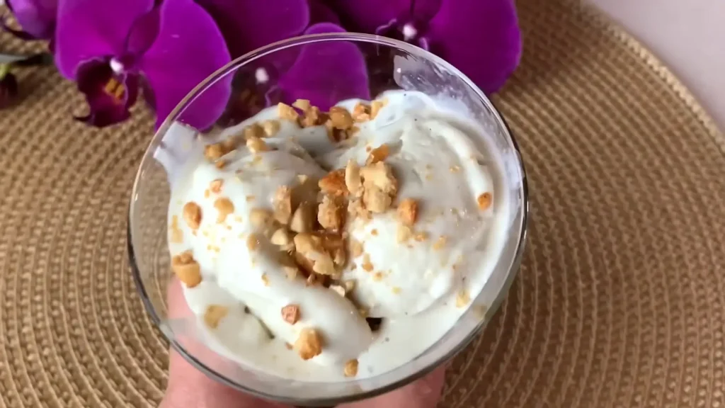 Cottage Cheese Ice Cream in a Cup with Almonds on top