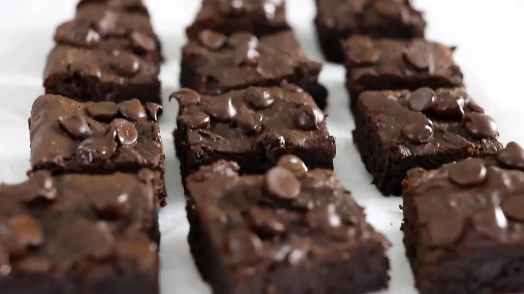 Pieces of Black bean brownie batter in a dish