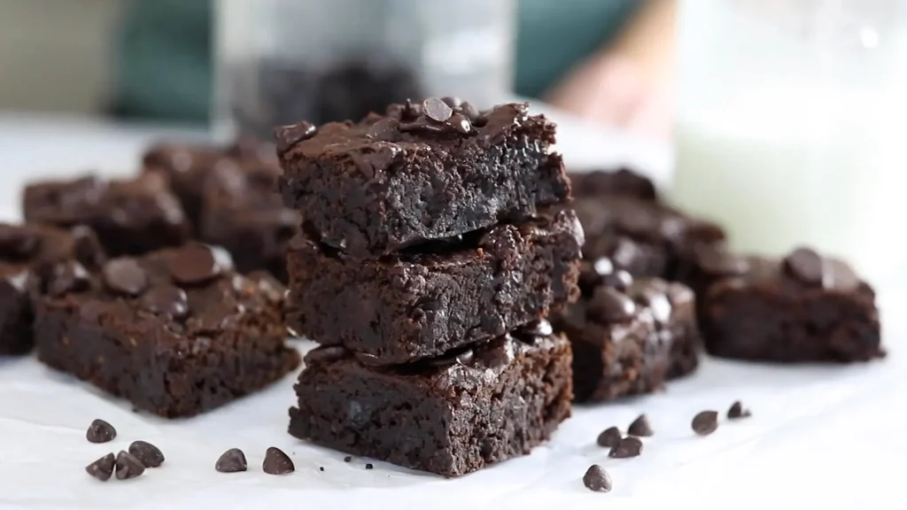 Pieces of Black bean brownie batter in a dish