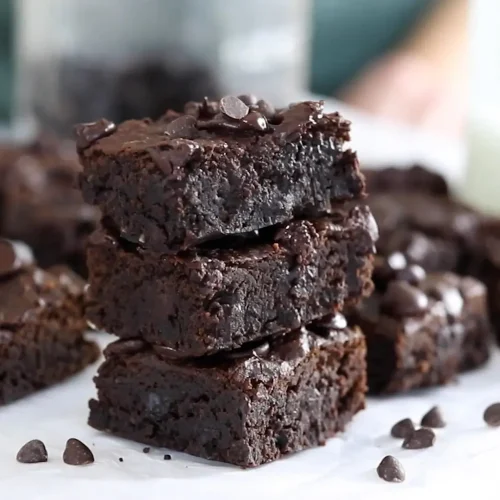 Pieces of Black bean brownie batter in a dish