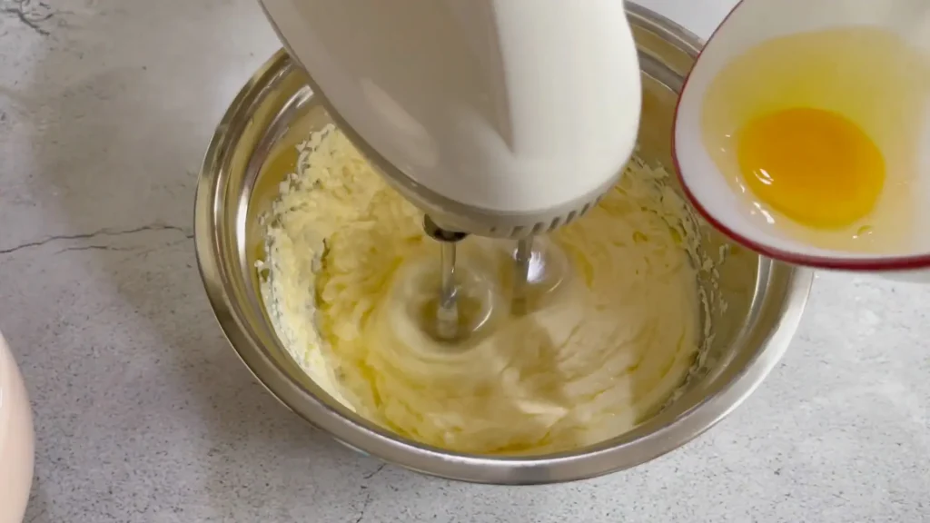 Adding Eggs into Butter, Sugar Mixture