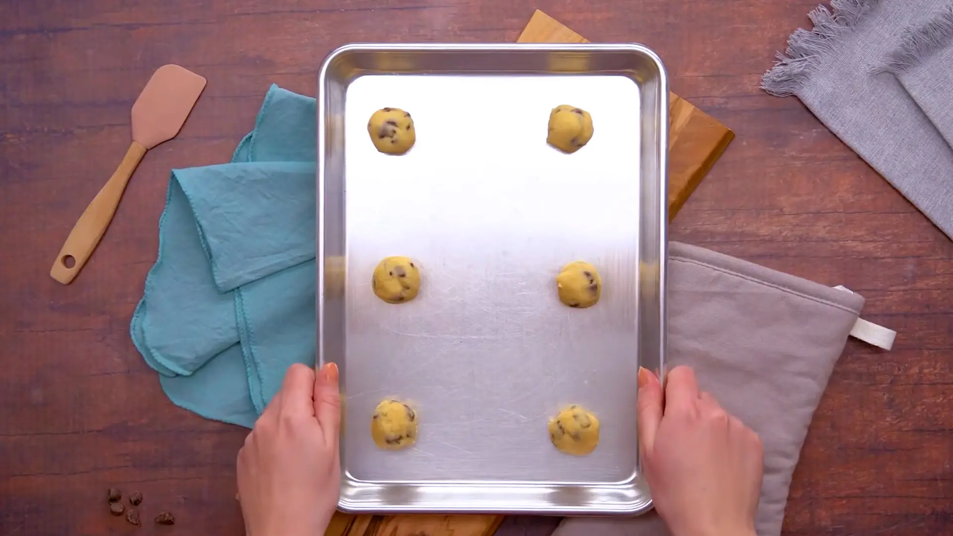 Nestle Toll House Cookie dough balls placed a part in a try and ready for baking