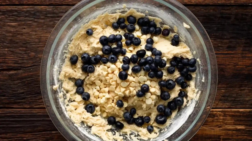 Adding Blue berries into Mixture